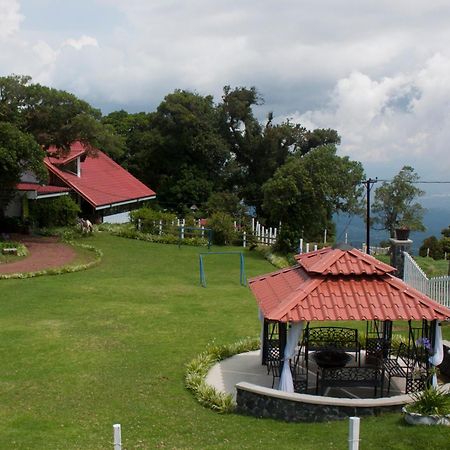 Altura Hotel Poasito Luaran gambar
