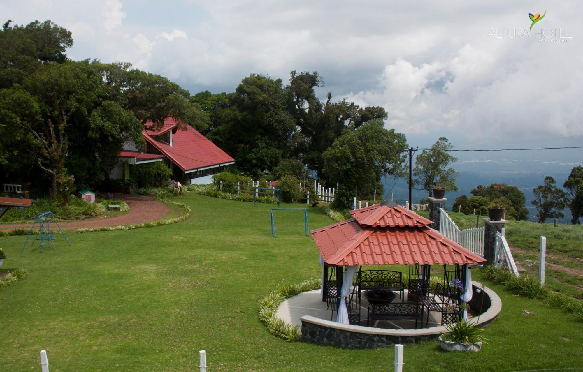 Altura Hotel Poasito Luaran gambar
