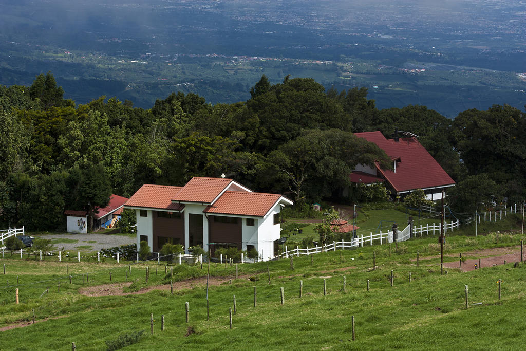Altura Hotel Poasito Luaran gambar