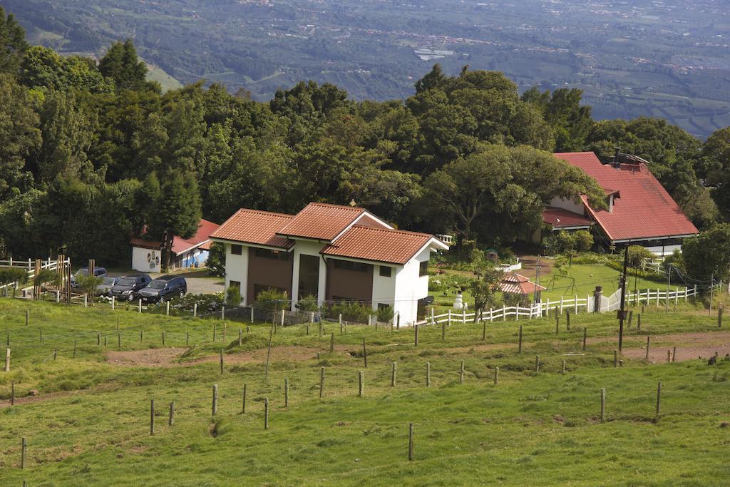 Altura Hotel Poasito Luaran gambar